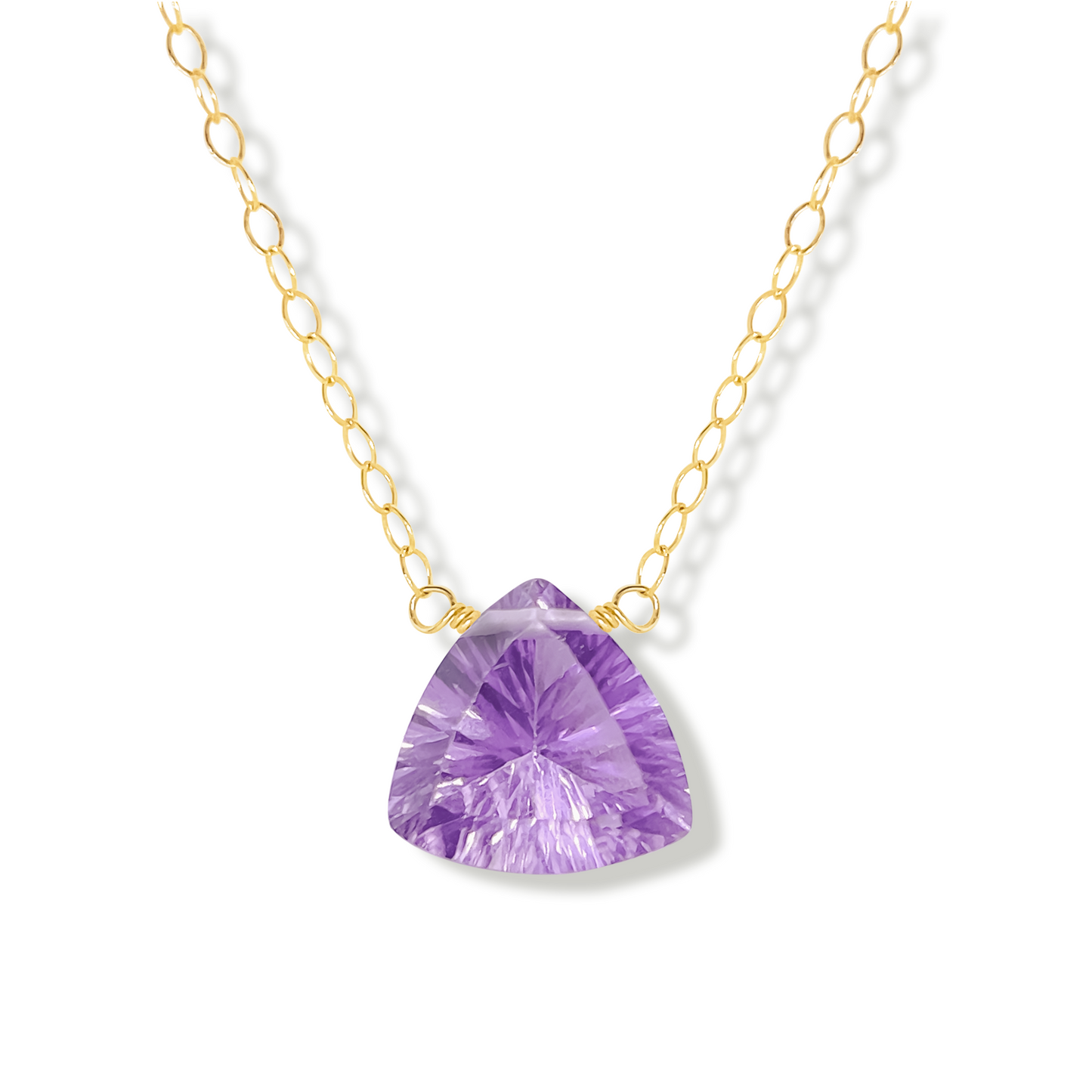 brazilian pink amethyst trillion gemstone pendant on a 14k gold-filled chain necklace on a white background.
