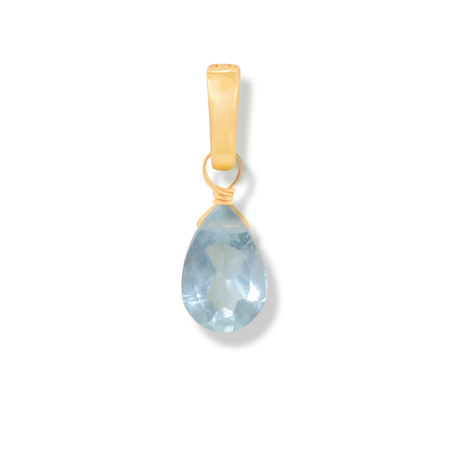 Gold pendant with a aquamarine pear cut gemstone on a white background