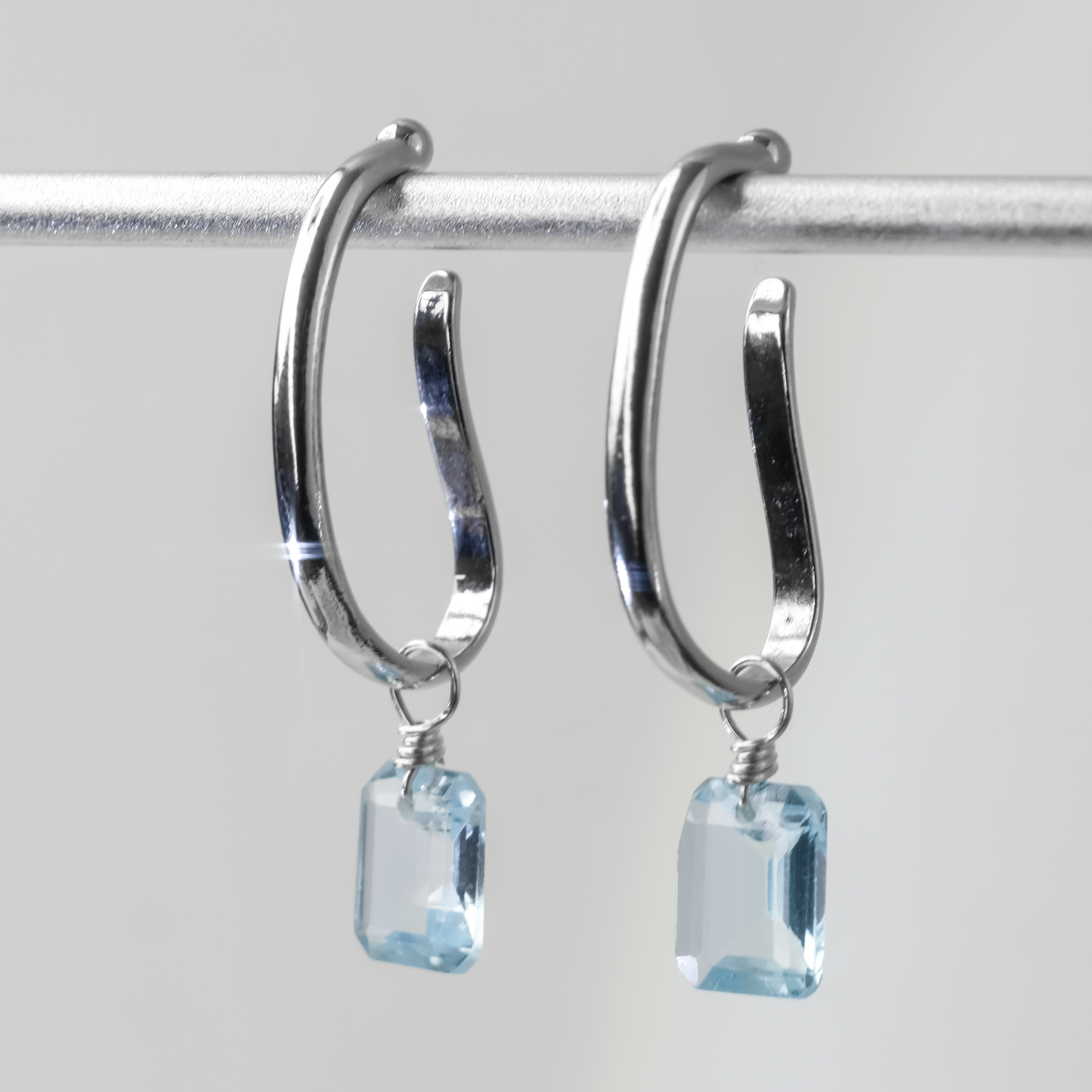 Blue Topaz Emerald Cut Rhodium Ear Cuffs