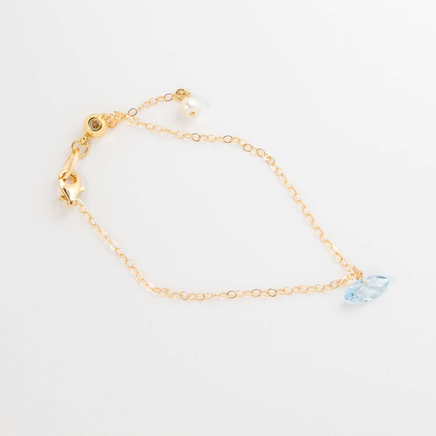 Chiara Blue Topaz Marquise Gold Chain Bracelet