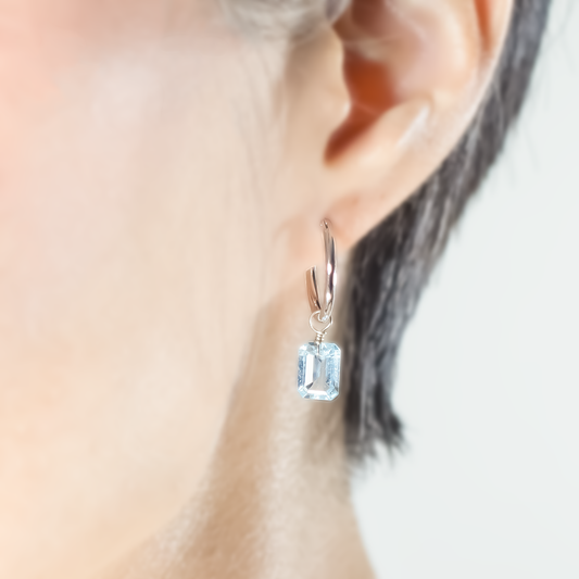 Blue Topaz Emerald Cut Rhodium Hoop Earrings