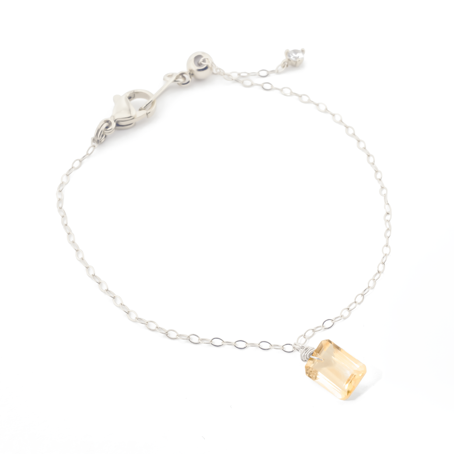 Sterling Silver bracelet with a rectangular citrine gemstone on a white background