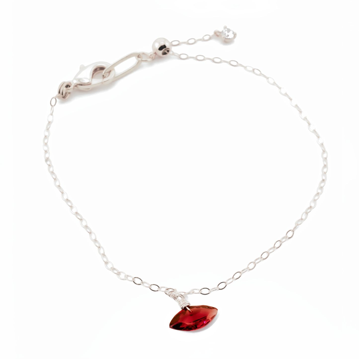 Sterling Silver bracelet with a garnet marquise cut gemstone on a white background