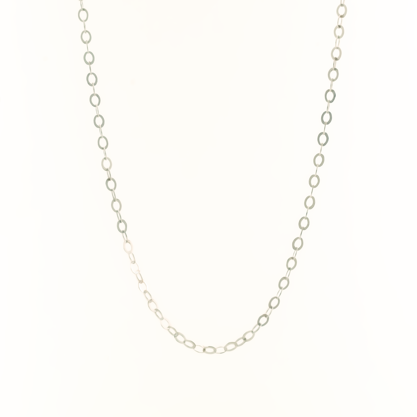 Sterling silver dainty chain necklace on a white background