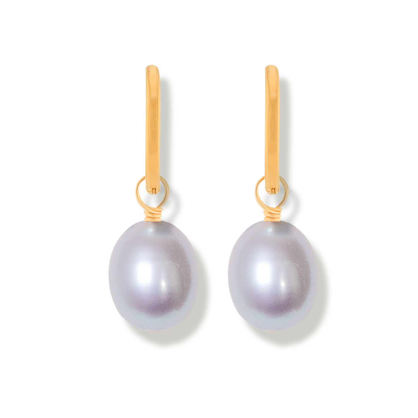 Pair of grey rice shaped pearl earrings with 14k gold-filled hoops on a white background