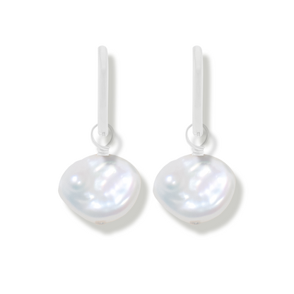 pair of silver earring with keishi pearls on a white background