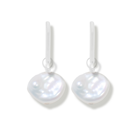pair of silver earring with keishi pearls on a white background
