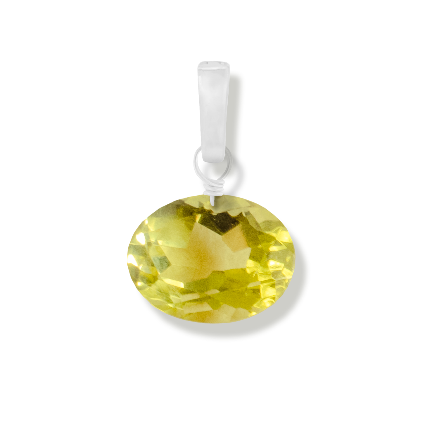 Lemon quartz oval cut charm on a white background.