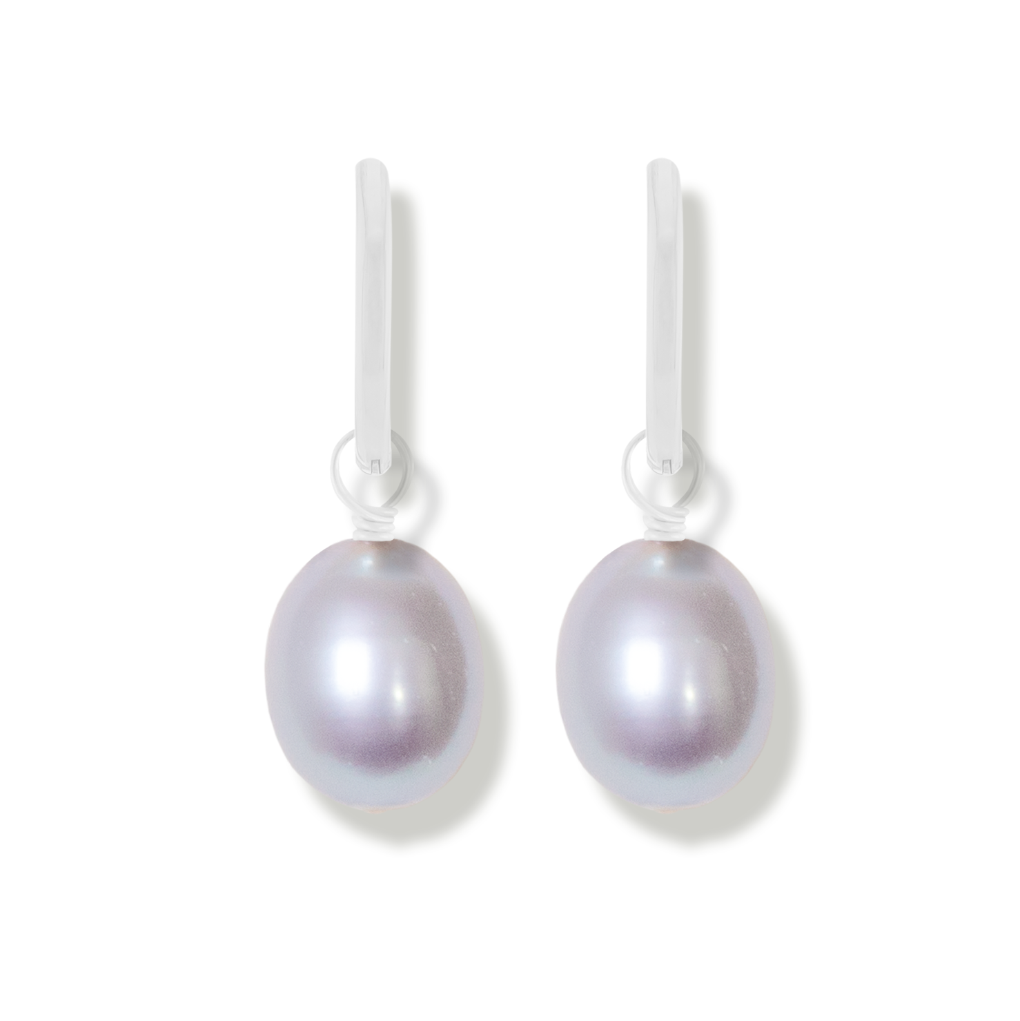 pair of grey rice shaped pearl on a white background