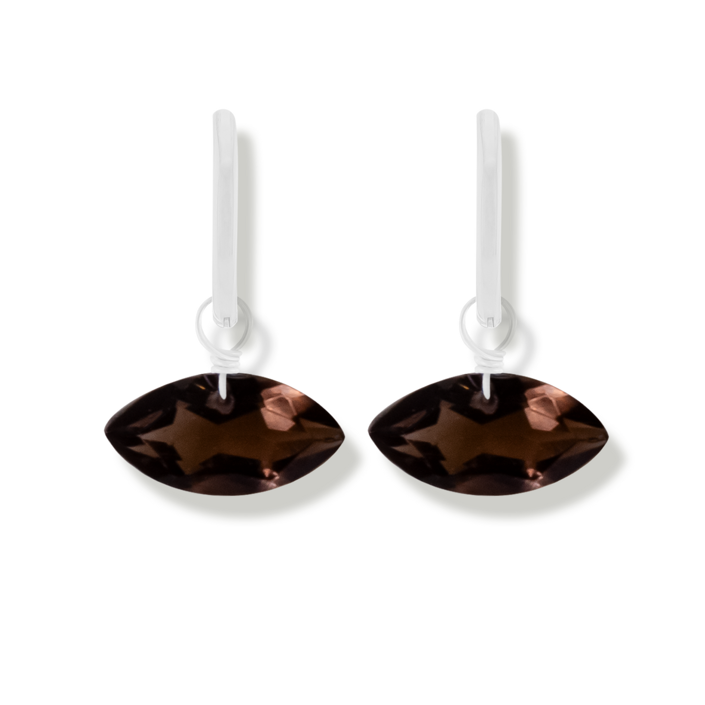 smoky quartz marquise cut silver earrings on a white background.