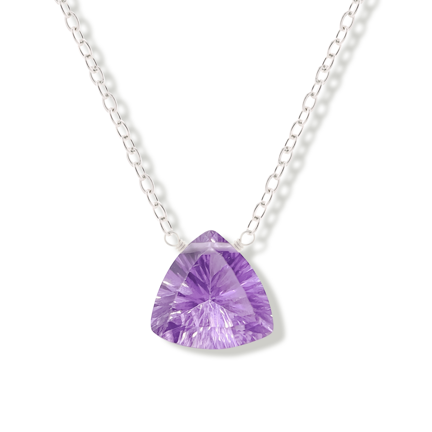 brazilian pink amethyst trillion cut gemstone on silver chain on a white background.