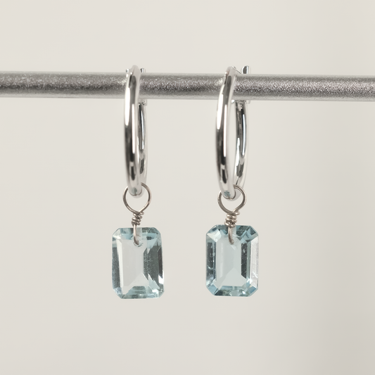 Blue Topaz Emerald Cut Rhodium Hoop Earrings