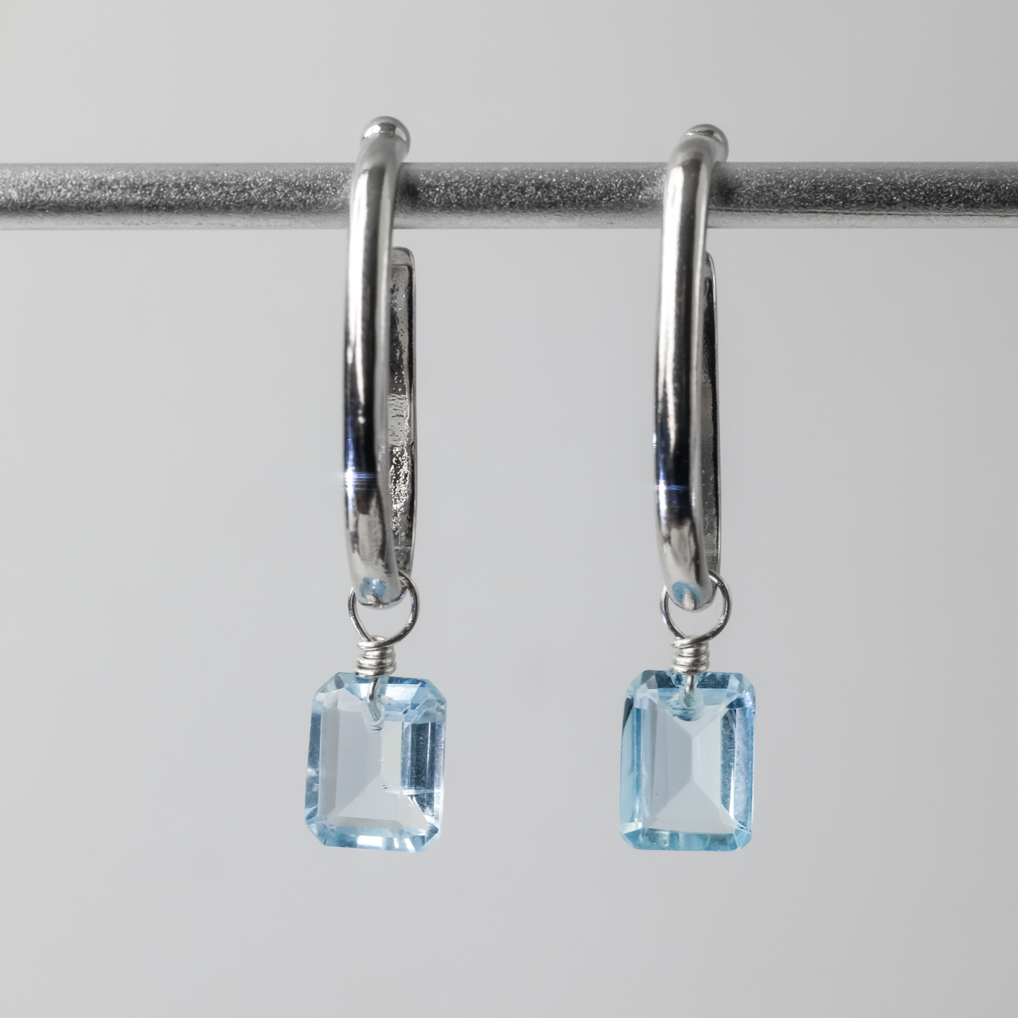 Blue Topaz Emerald Cut Rhodium Ear Cuffs