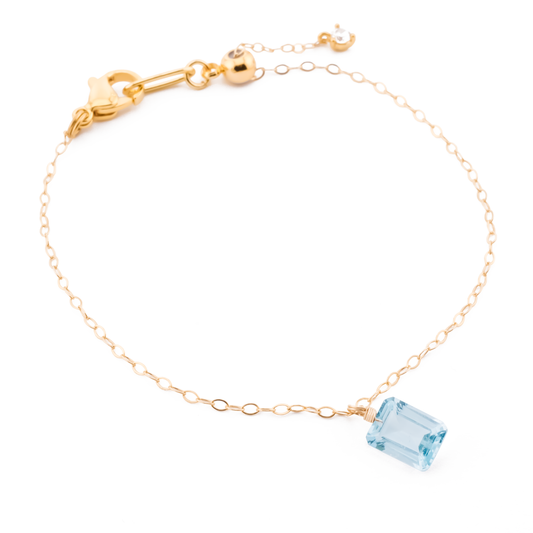 14k gold-filled dainty chain bracelet with emerald cut Blue Topaz gemstone charm.