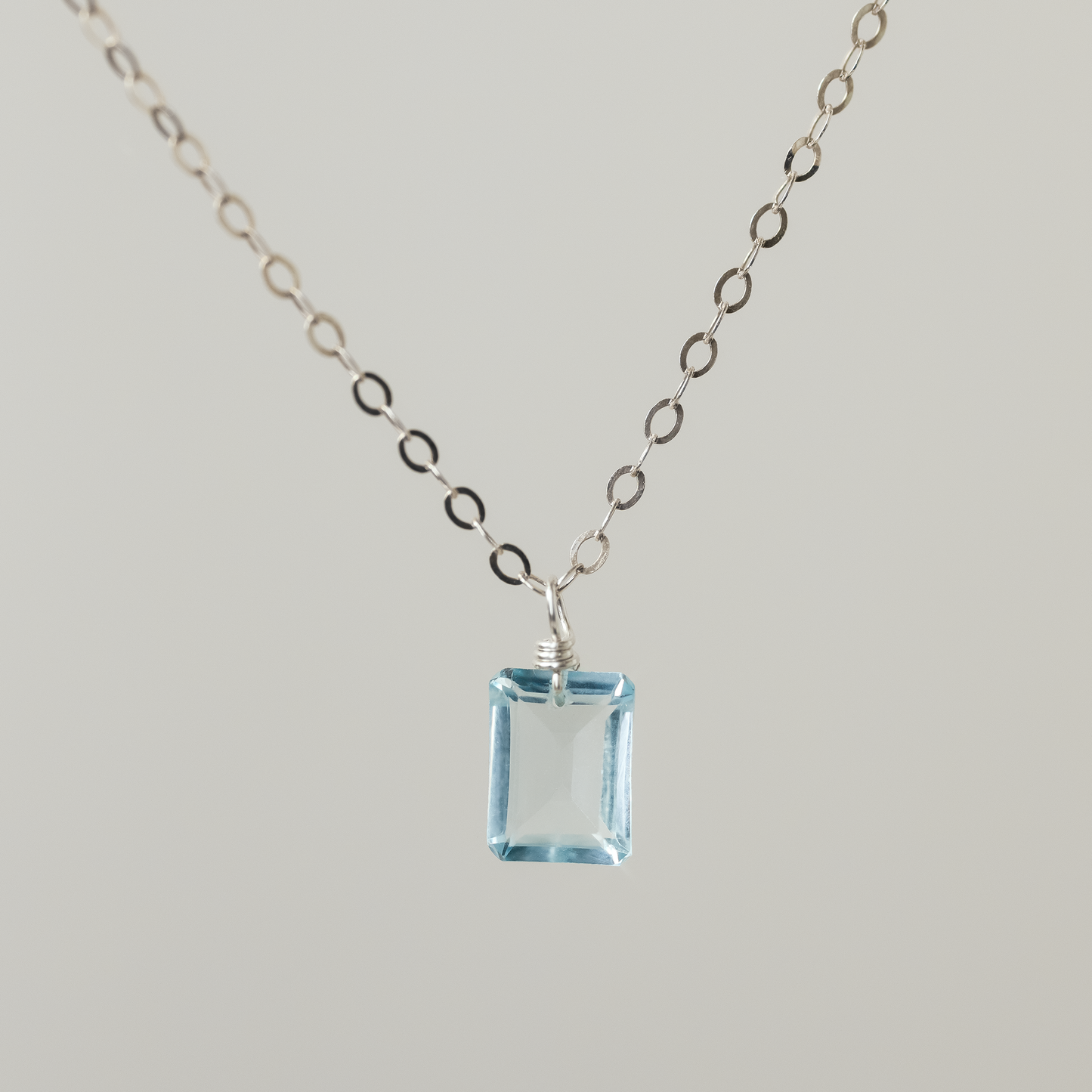 Floating Gem Blue Topaz Emerald Cut Sterling Silver Necklace