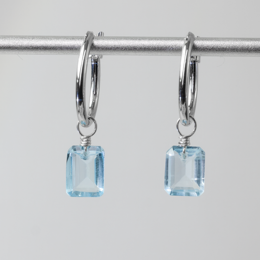 Blue Topaz Emerald Cut Rhodium Hoop Earrings