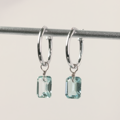 Blue Topaz Emerald Cut Rhodium Hoop Earrings