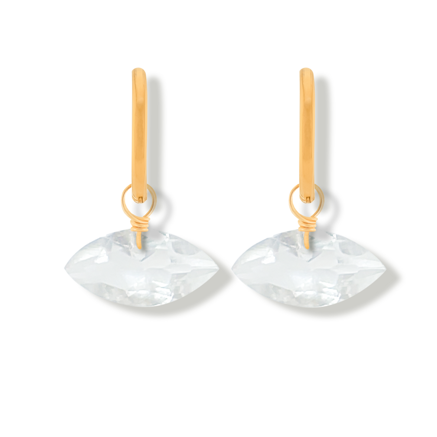 pair of rock crystal marquise cut gemstones on 14k gold-filled hoop earrings on a white background.