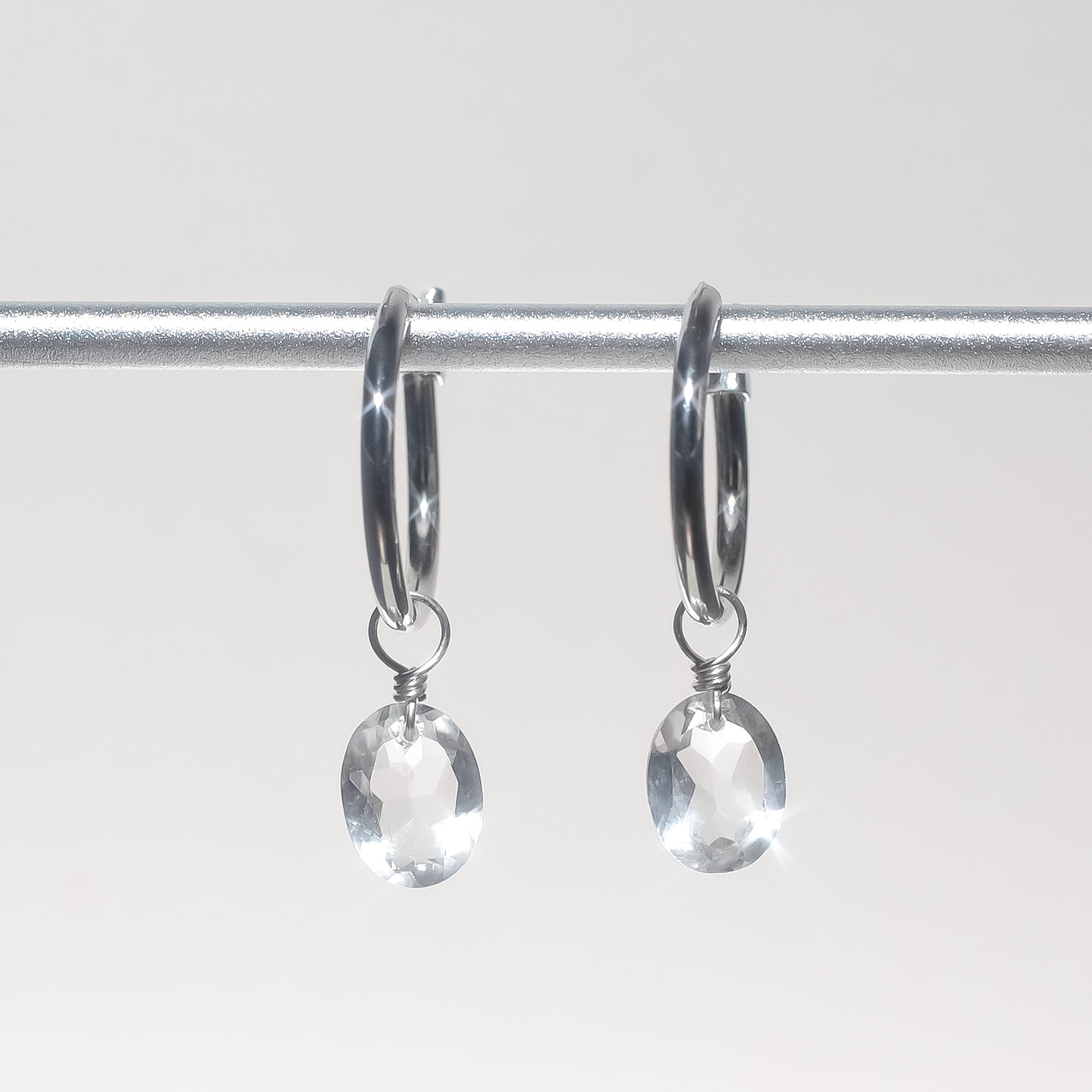 Rock Crystal Oval Cut Rhodium Hoop Earrings