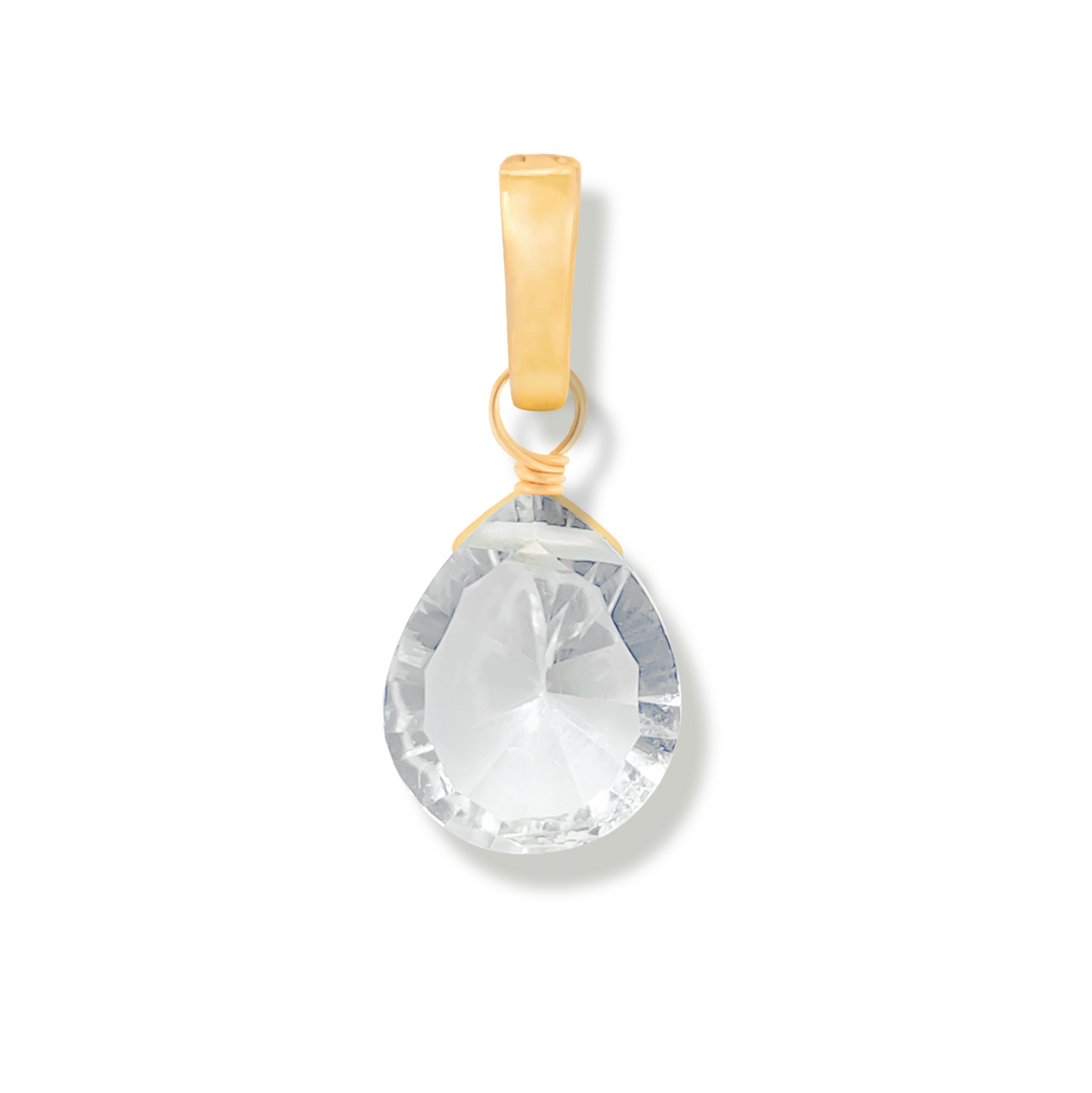 Gold pendant with a rock crystal pear cut gemstone on a white background