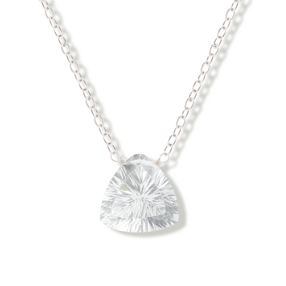 Silver necklace with a rock crystal gemstone pendant on a white background