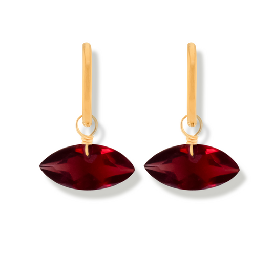 Pair of earrings with garnet marquise cut gemstones and 14k gold-filled hoops on a white background