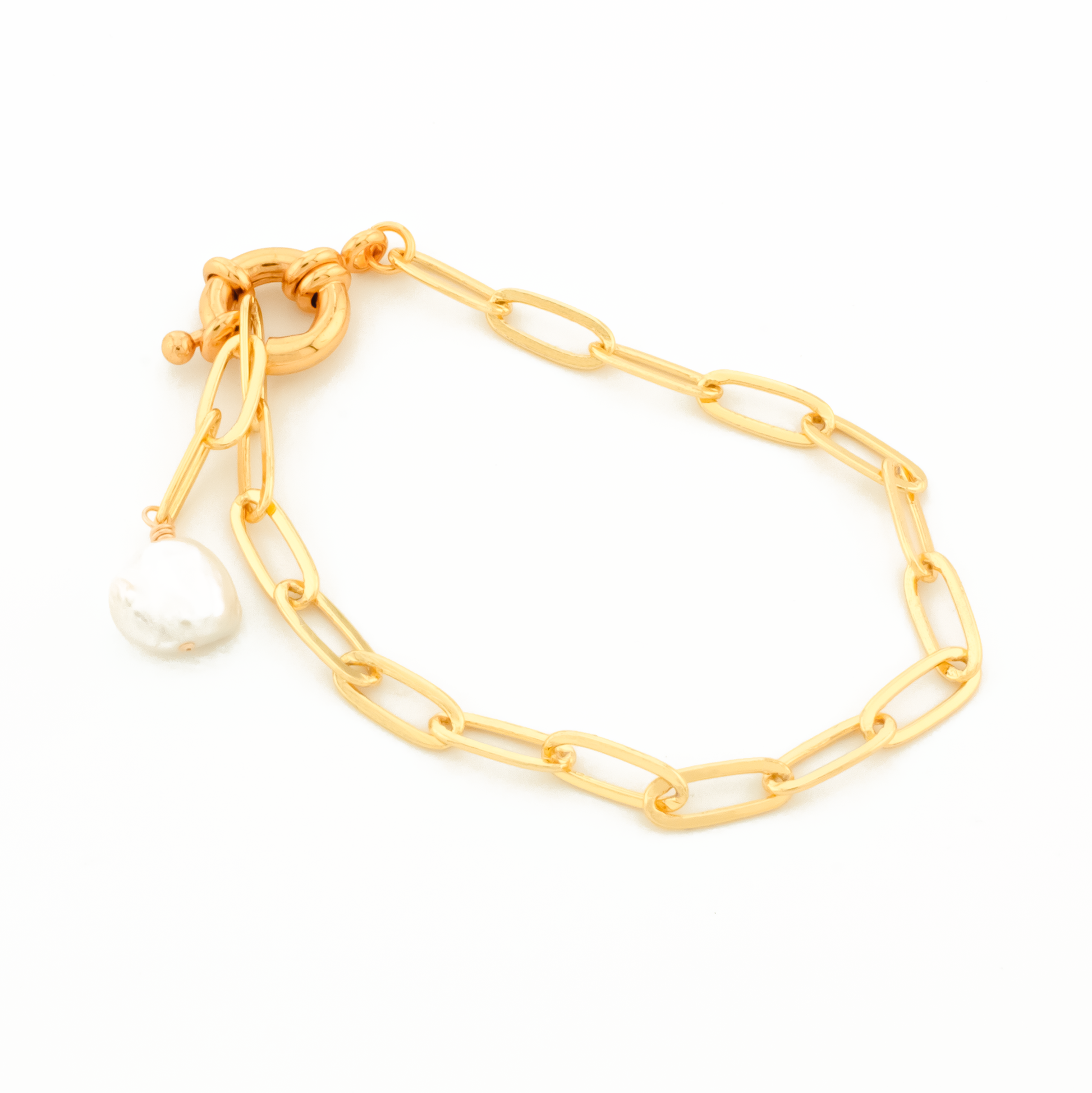 14k gold-filled paperclip chain bracelet with nautical clasp and keishi pearl charm on a white background.
