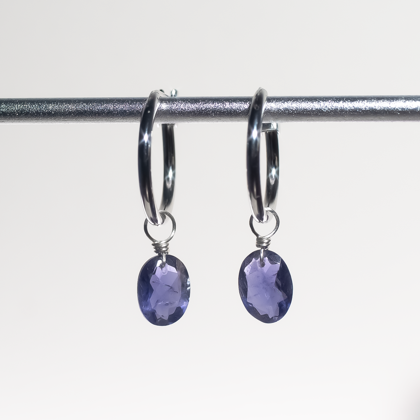 Iolite Oval Cut Rhodium Hoop Earrings
