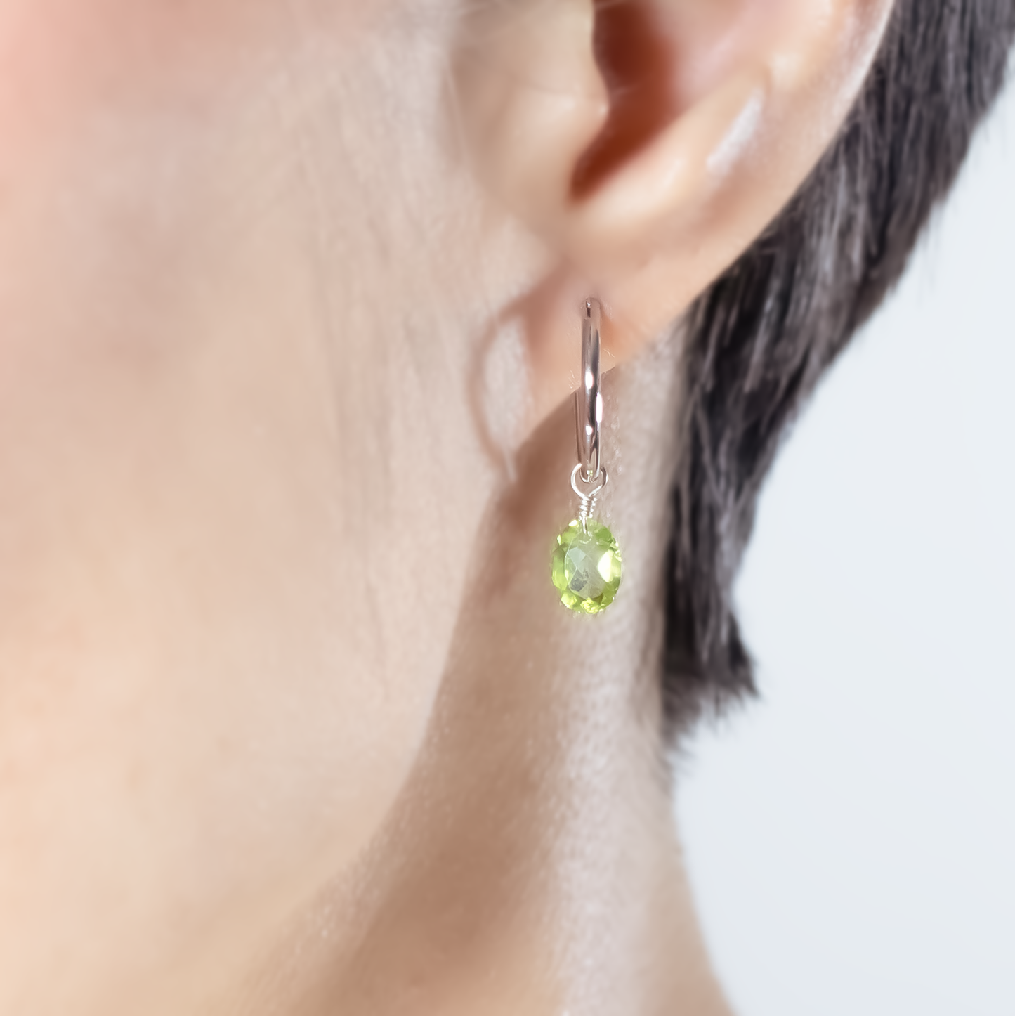 Peridot Oval Cut Rhodium Hoop Earring