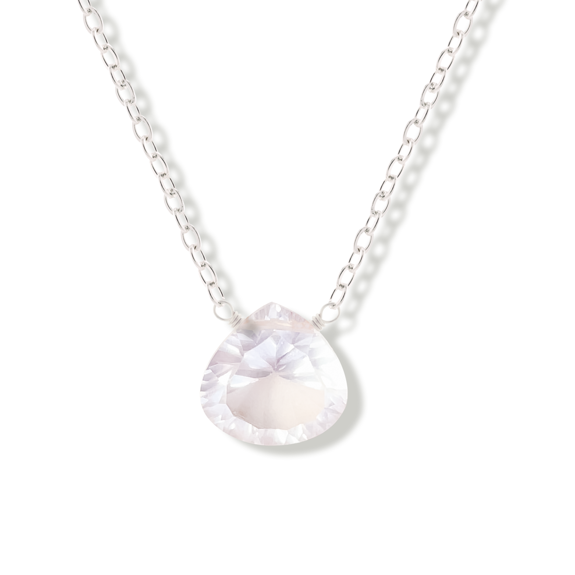 rose quartz teardrop shaped gemstone on a sterling silver chain on a white background.