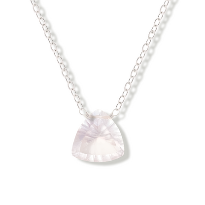 rose quartz trillion cut gemstone pendant on a sterling silver chain on a white background.