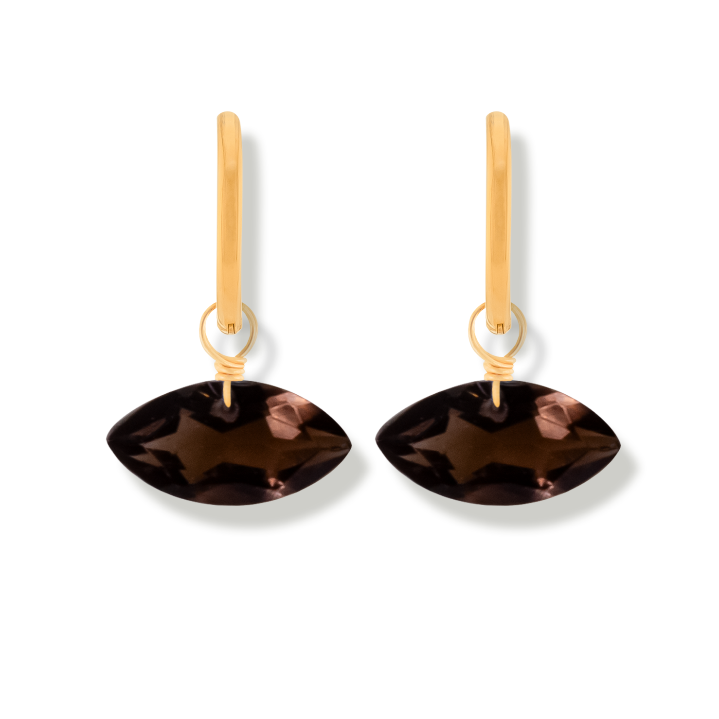 Pair of earrings with smoky quartz marquise cut gemstones and gold hoops on a white background